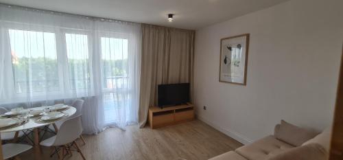 Nowoczesny jasny apartament nad Jeziorem