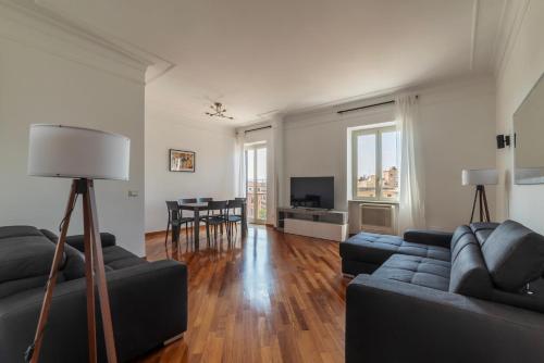 GuestHost - Bright Apartment in Metro San Giovanni, Řím