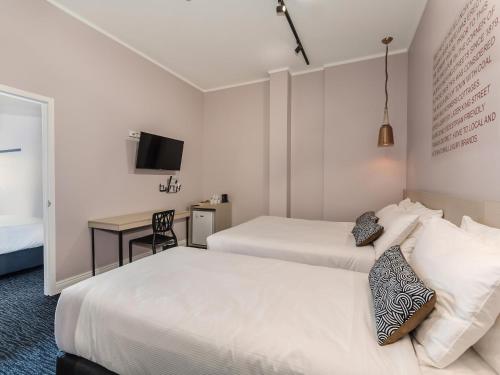 Studio Family with Free Welcome Drink For Two Guests room in Nightcap at Belgian Beer Cafe
