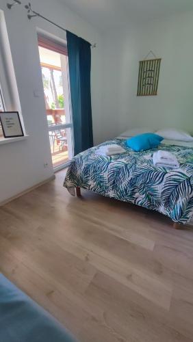 Apartamenty Poddąbek- basen kryty, sauna, animacje dla dzieci , małpi gaj, baseny na dachu