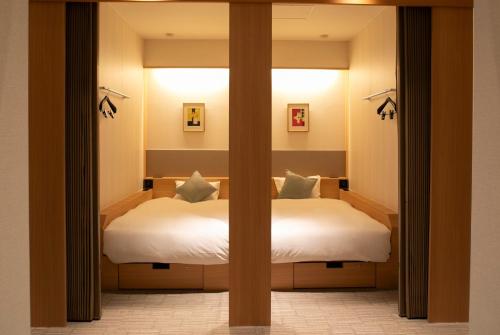 Bed, HOTEL LADIES PLAZA YOKOTE in Yokote