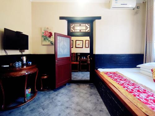 Pingyao Xiangshengyuan Guest House - 공용 라운지/TV 시청 구역