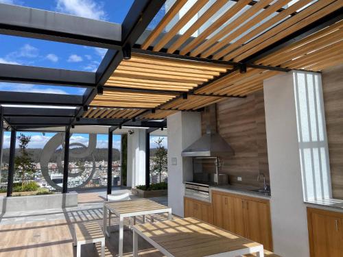 Beautiful apt-balcony in La Carolina 70 QLED TV - image 4