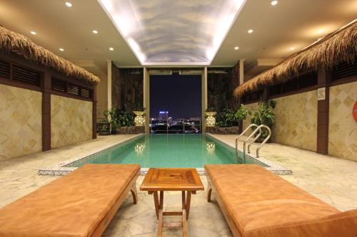 Swimming pool, Harmoni Suites Hotel in Batam Island