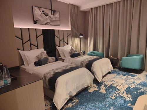 Taj Lives Hotel – Umluj, MI
