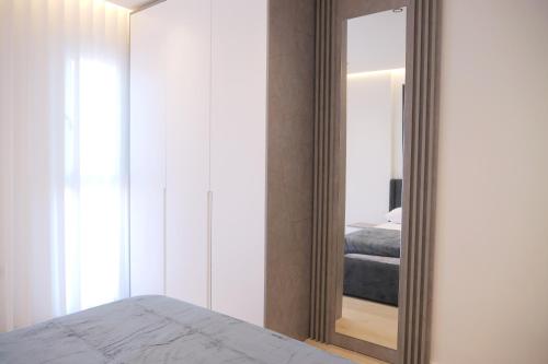 One-Bedroom Apartment with Balcony and City View image 10