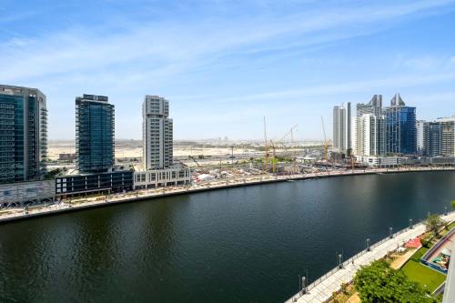 Designer 1BR Retreat With Stunning Canal View, Dubaj (fotografie 5)