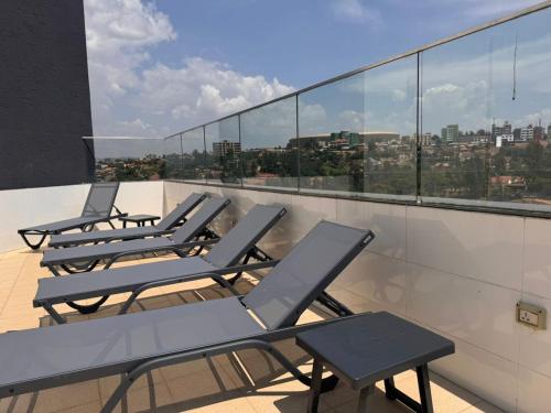 キガリ Cascadia Hotel Apartments by GF Greenland 4つ星 ホテル 客室