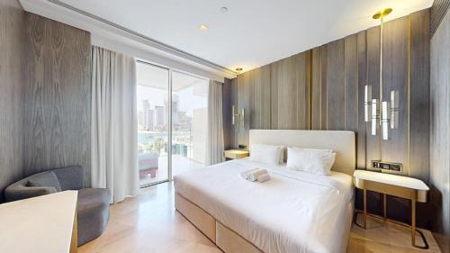 Vacationer Holiday Homes I Opulent 2 Bedroom I Sea View I Beach Access l FIVE Palm, Dubaj (fotografie 4)
