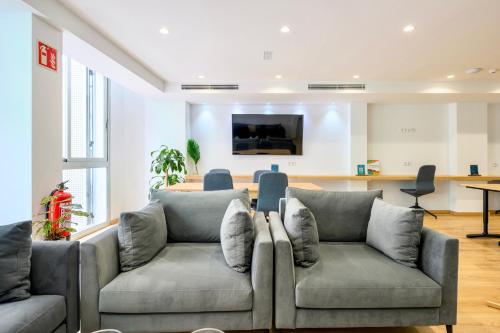 Aufenthaltsraum/TV-Zimmer, Hotel Emeté & Coworking by Airnest (Hotel Emete & Coworking by Airnest) in Gran Canaria