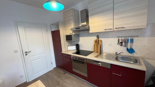 Kitchen, Haus am Roblinsee - Ferienwohnungen in Furstenberg in Furstenberg-Havel