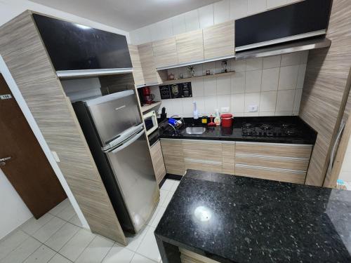 Apartamento em região central e perto da rodovia (Apartamento em regiao central e perto da rodovia) in อนิตาการิบัลดี