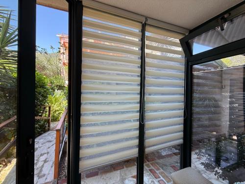 One-Bedroom Apartment with Terrace and Garden View image 9
