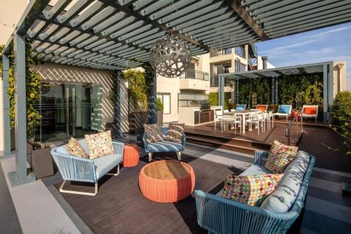 The Lush Lookout - Nature-Inspired 2BR with Private Balcony