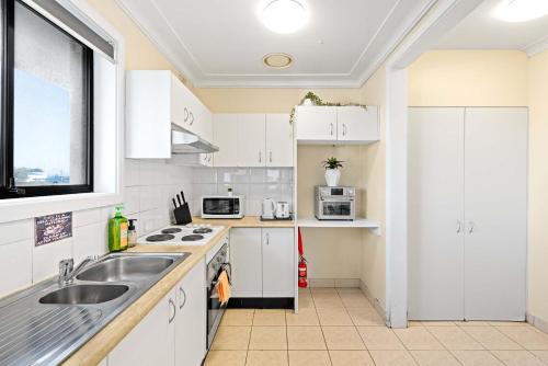 Well-Located Single Room in Auburn - Near Station and Shops - Shared Bathroom in 雪梨奧林匹克公園