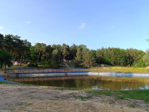 Domek nad Wierną Rzeką (Domek nad Wierna Rzeka) in Malogoszcz