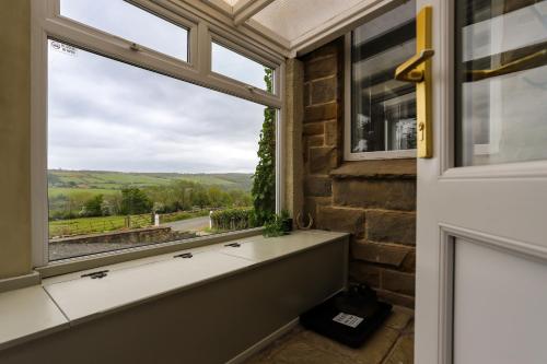 Exterior view, Brambly Cottage in Littlebeck