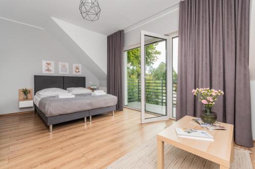 Przystanek Jantar - pokoje i apartamenty