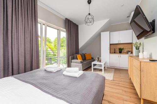 Przystanek Jantar - pokoje i apartamenty