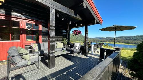 Rõdu/terrass, Luxury family house "Berg" with outdoor sauna, hot tub and lake view in Ovre Ramse