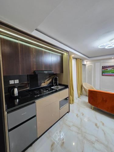 Suna'a home Logpom in Douala