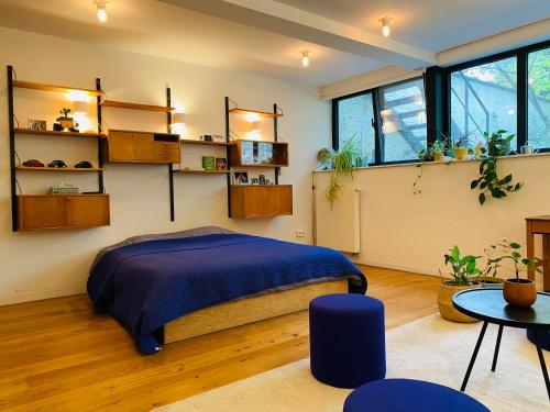 Ruime kamer dubbel bed zicht op tuin chambre d'hôte Zurenborg