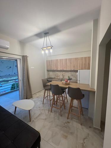 Blue Calm - Kalamos Seaside Studios in Agii Apostoli