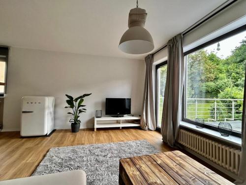 Koplietošanas atpūtas telpa ar TV, Modern Wohnung in der Nähe von Koblenz (Modern Wohnung in der Nahe von Koblenz) in Urbar (Mayen-Koblenz)