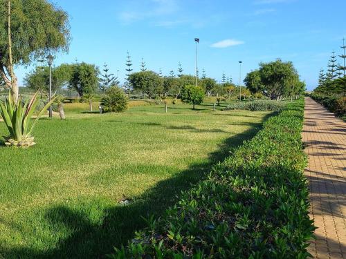 גינה, Appartement avec Terrasse, Piscine & Plage à Ola Blanca 2 (Appartement avec Terrasse, Piscine & Plage a Ola Blanca 2) in סידי רחאל