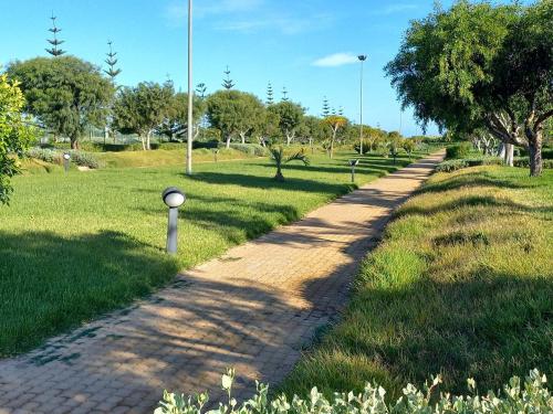 גינה, Appartement avec Terrasse, Piscine & Plage à Ola Blanca 2 (Appartement avec Terrasse, Piscine & Plage a Ola Blanca 2) in סידי רחאל