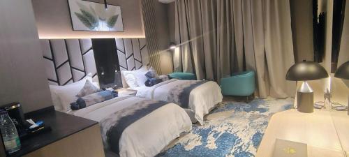 Taj Lives Hotel – Umluj, MI