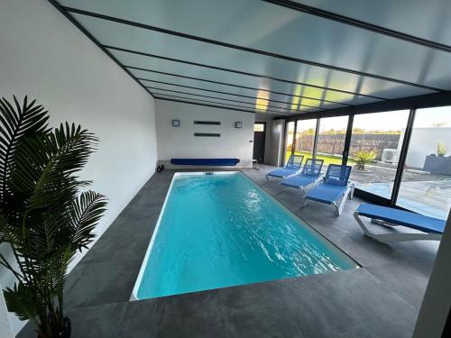 Villa récente avec piscine intérieure chauffée, 10 personnes - Location, gîte - Saint-Jean-de-Monts