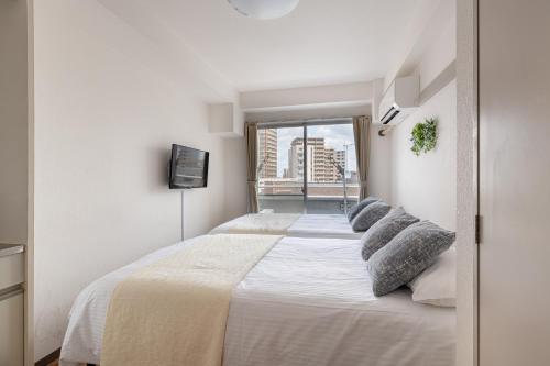 アスピア502 7-minute walk from Nishi-Sugamo Station 9-minute walk from Sugamo Station 1-minute walk from Koshinzuka WiFi available, Токио