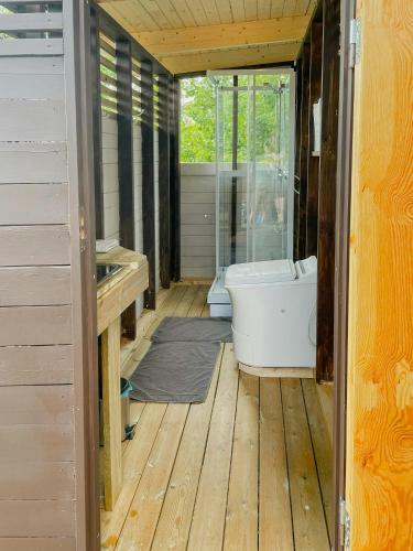 Exterior view, Log Cabin By Gota Canal in Norrkoping