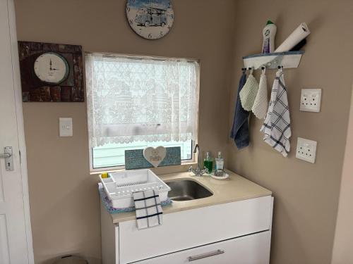 virtuve, Knight & Sunshine Luxury Flatlet in Van Dyks Bay