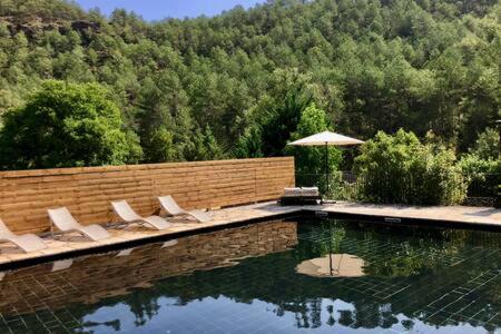 Acogedora casa en la montaña (Acogedora casa en la montana) in La Baronia de Rialb