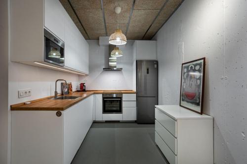 Loft estilo industrial en Esplugues - 15 min de Barcelona in เอสปลูเกส เด โยเบรกัต