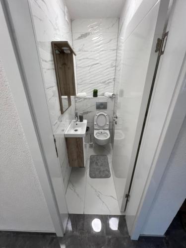 Three-Bedroom Apartment room in Luxe Urban Apartments Ilidza