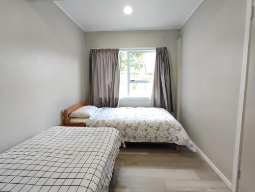 Wast area 3 bedroom home at Massey, Auckland (Foto 10)