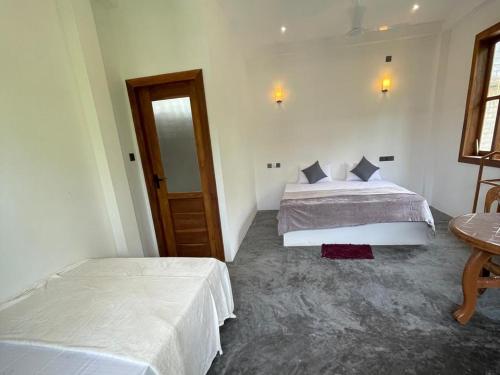 Comfort Triple Room room in Sea Wawes Hiriketiya
