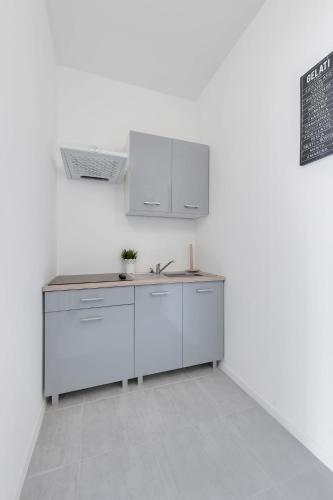 Fabryczna Station Rooms and Apartments in Widzew