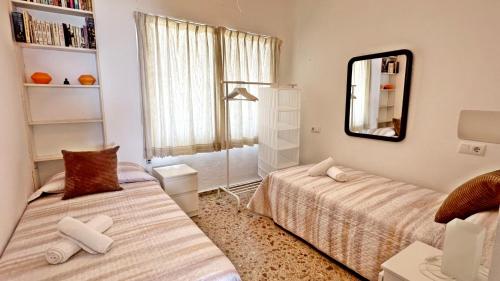 Three-Bedroom Apartment room in INFANTE VISTAS AL MAR - playa de Gandia - Solo Familias