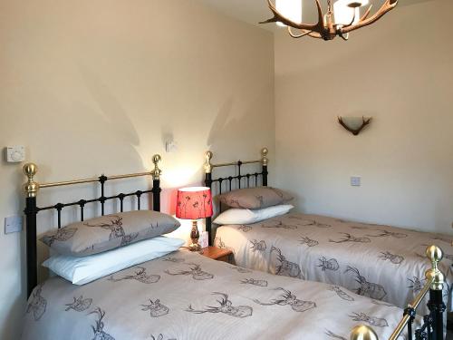 Зовнішній вигляд готелю, Turin Nurin Cottage in Томатін