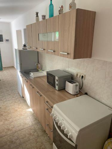 virtuve, Fehér Bagoly Vendégház (Feher Bagoly Vendeghaz) in Kovácsszénája