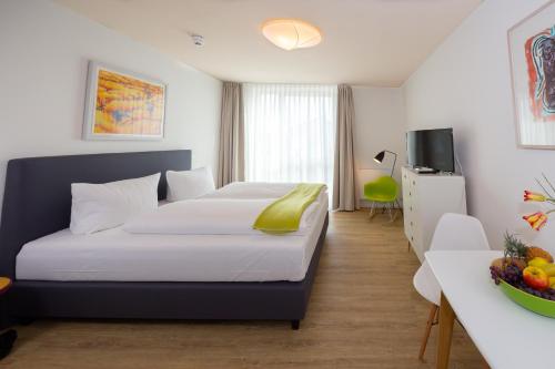 Foto 1: Country Inn Suitenhotel