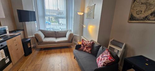 Waterworks En suite Rooms with Private Living Room in สเกโกเนล