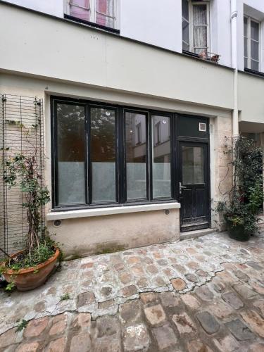 Studio lumineux sur cour à Bastille, Paris