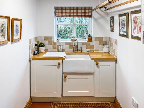 Viesnīcas āriene, Woodhouse Cottage in Penyffordd