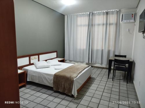 Hotel Aeroporto Ltda near สนามบินเอวริโก เด อาเกียร์ ซัลเลส