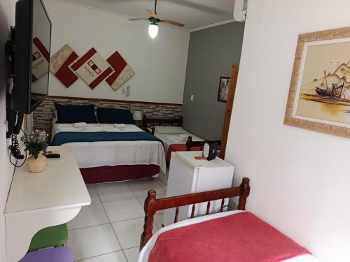 Quadruple Room room in Pousada Cavalo Branco